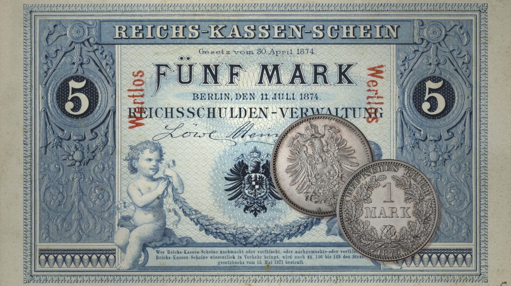 Reichskassenschein 5 Mark, sowie 1-Mark-Stück (Quelle: Münzkabinett der Staatlichen Museen Berlin)