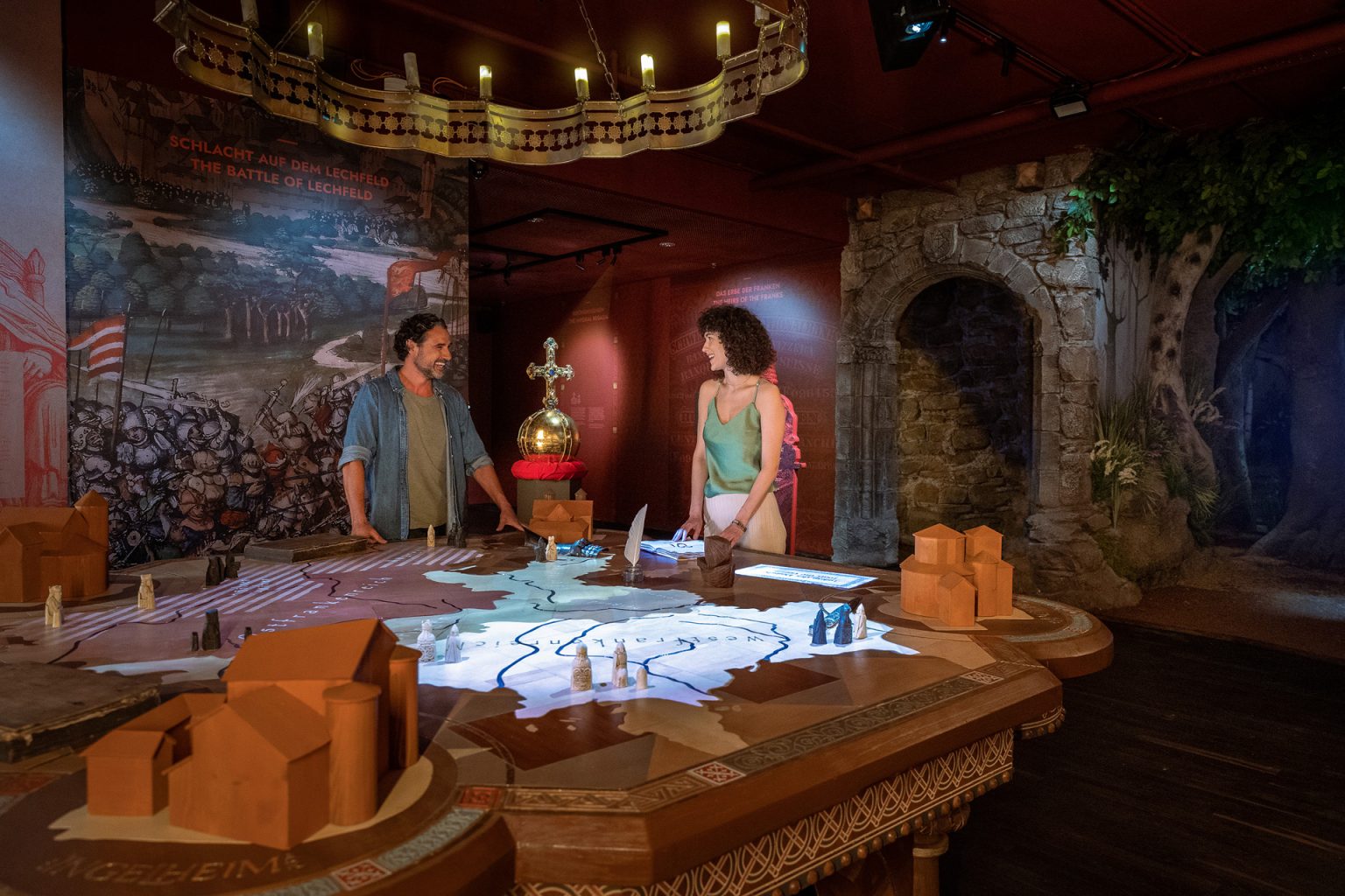 Couple in the exhibition space of the Deutschlandmuseum, Early Middle Ages section
